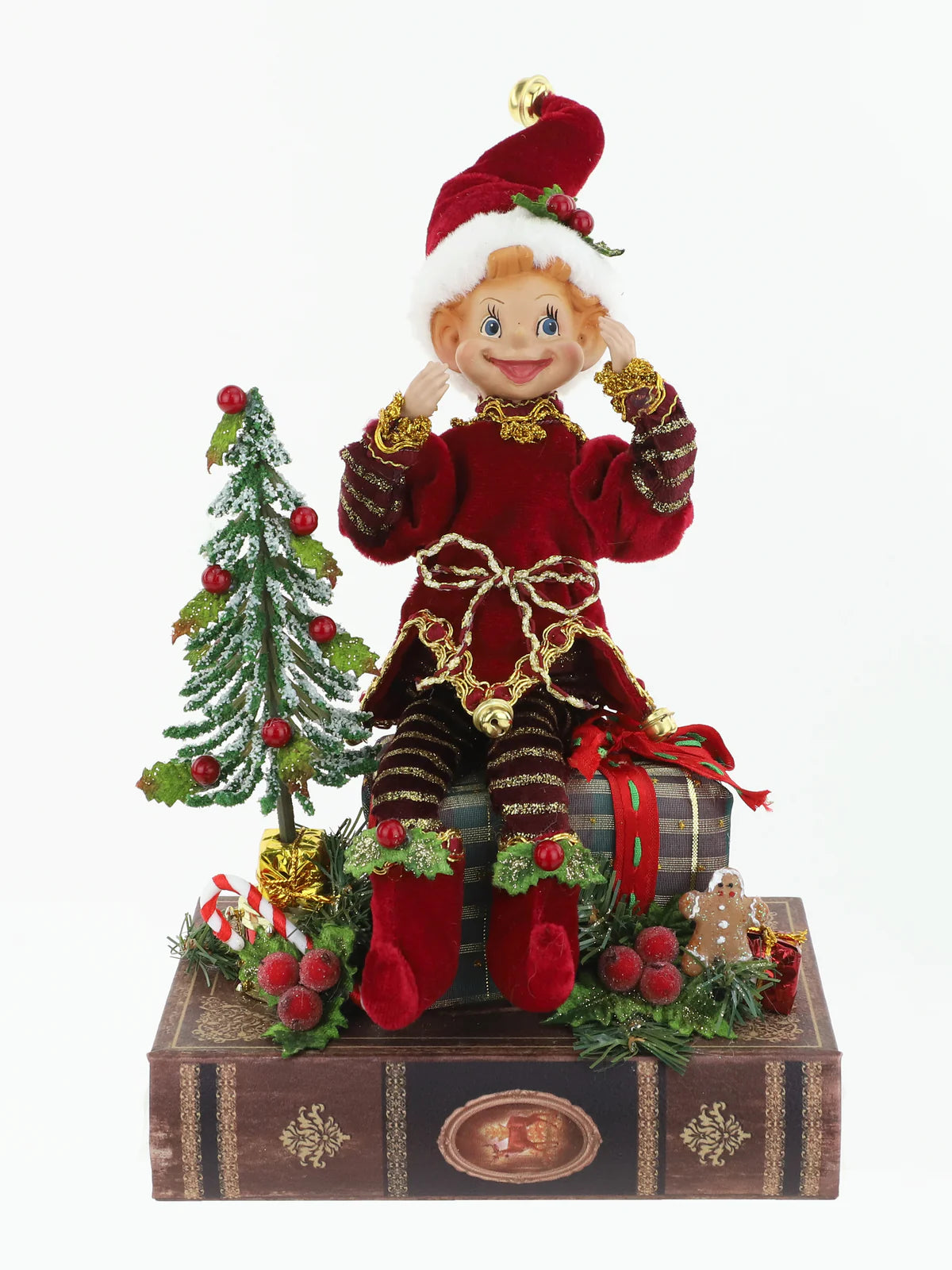 CHRISTMAS ELF ON OPENING BOOK