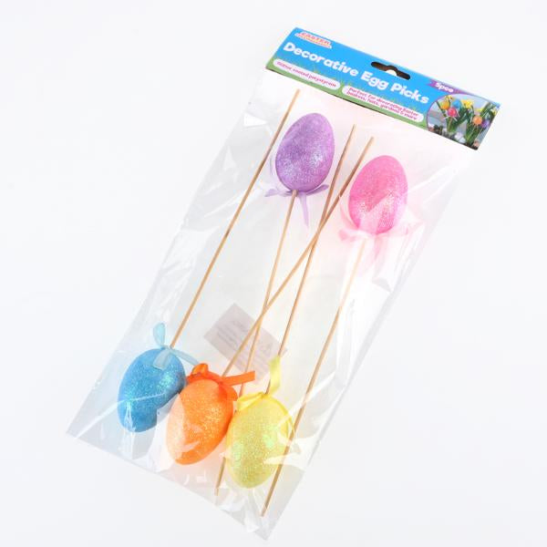 Polystyrene Egg On Pick With Glitter 5pc Total Length: 26cm (Egg - 6cm x 4cm) Blue, Yellow, Pink, Purple & Orange Per Pack